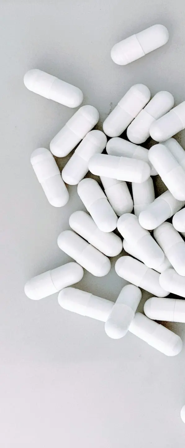 white medication capsules